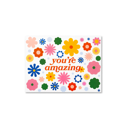 You're Amazing groovy rainbow flowers greeting card.
